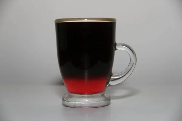 Espresso coffee with liqueur — Stock Photo, Image