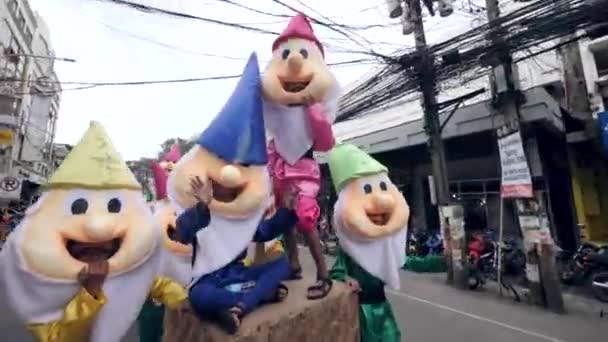 Dumaguete City, Philippines 10-18-2019: Jolly mascots at Buglasan Festival parade — стокове відео