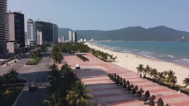 Aerial view of a sparsely populated city beach in Da Nang, Vietnam on summer day — Stock Video