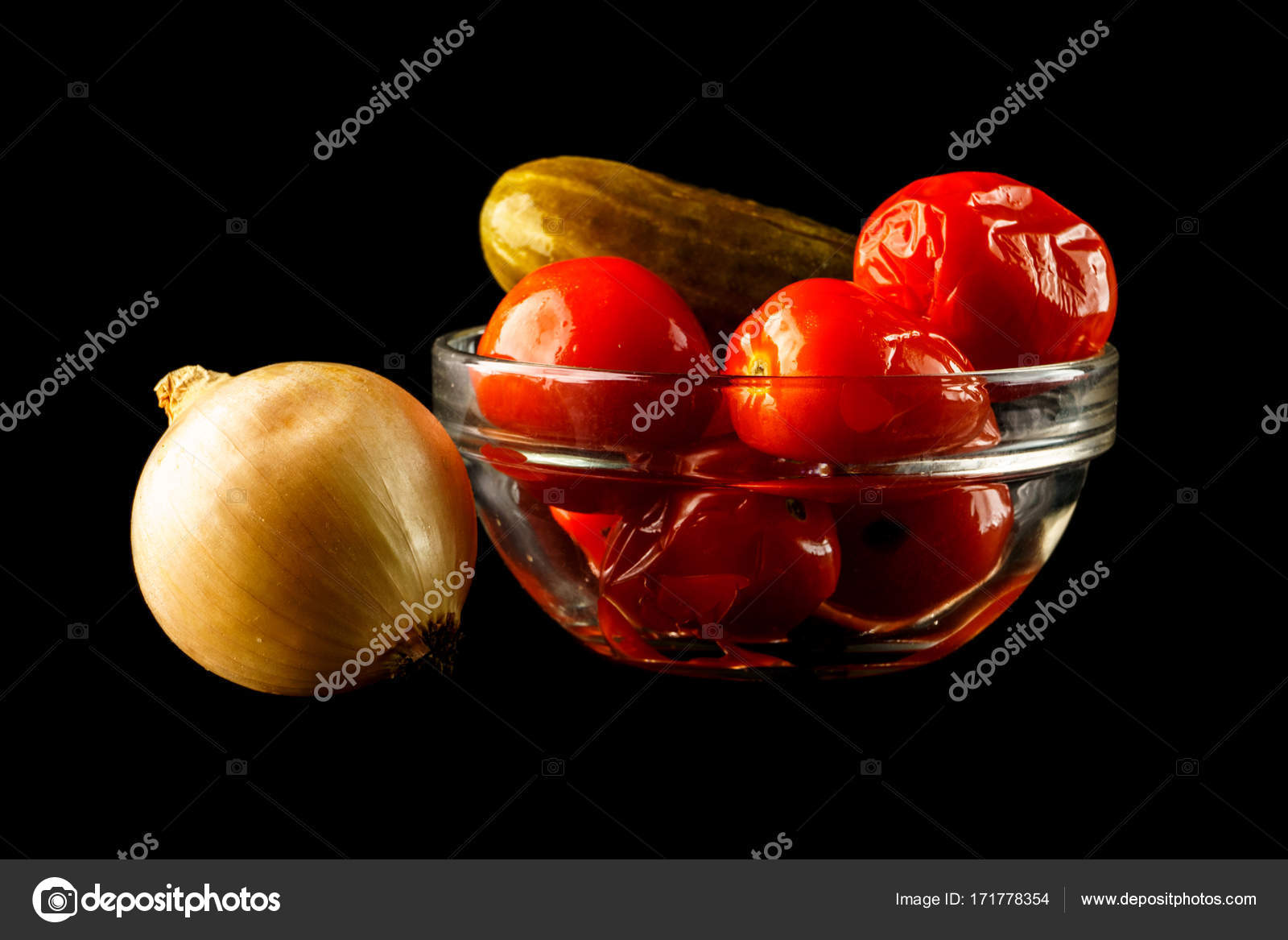 Leek And Salted Cucumber With Tomatoes In Glass Vase Onion And