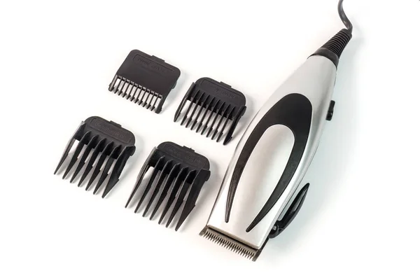 The machine for a hairstyle with attachments. Barbershop. Hair c — Stock Photo, Image