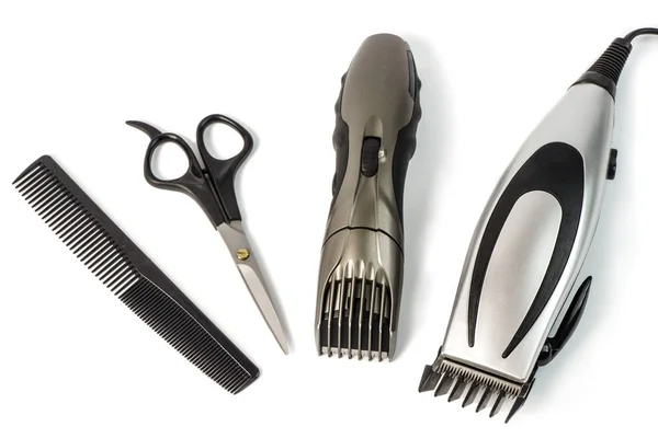 The machine for a hairstyle and hair trimmer. Hair clippers and hair trimmer with comb and scissors isolated on white background. — Stock Photo, Image