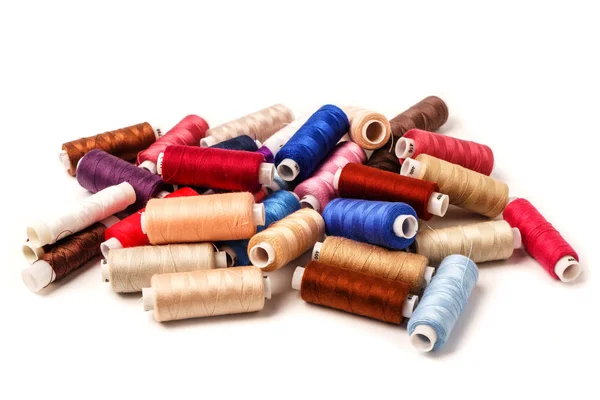 Colored bobbins isolated on white background. Colorful cotton ya — Stock Photo, Image