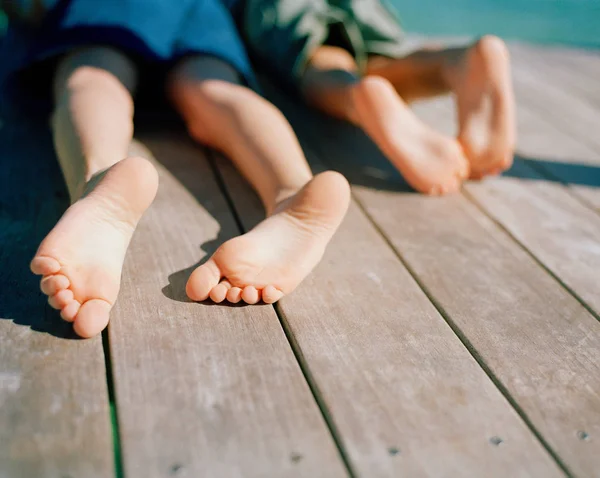 Two Boys Lying Wooden Pier Close — Stock Photo, Image