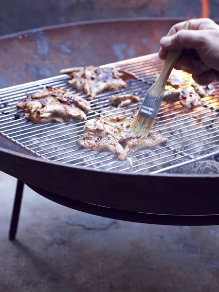 Mans Hand Painting Cooking Oil Quail Breast Barbecue — Stock Photo, Image