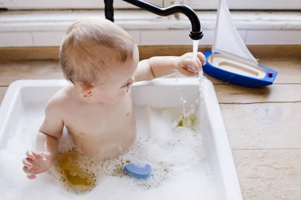 Baby Boy Bathing Kitchen Sink Touching Running Water — Stock Photo, Image