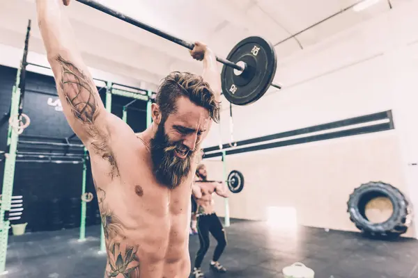 Young Male Cross Trainer Snatch Lifting Barbell Gym — Stock Photo, Image