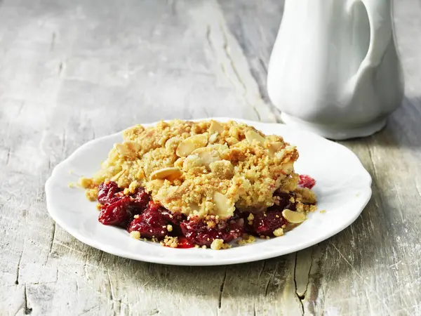 Sour Cherry Almond Crumble Pudding White Plate — Stock Photo, Image