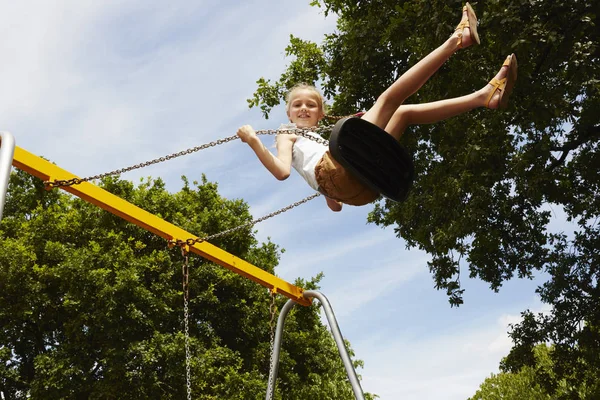 Low Angle View Girl Swing Looking Camera Smiling — Stock Photo, Image