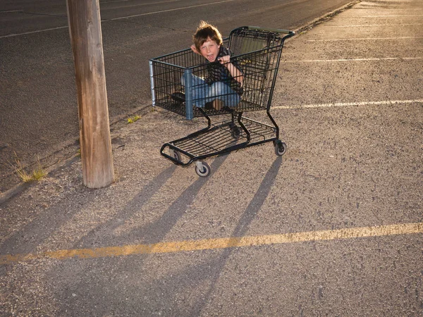 Boy Using Shopping Cart Vehicle — Stock Photo, Image