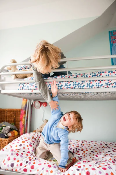 Young Boys Playfighting Bunk Bed — Stock Photo, Image