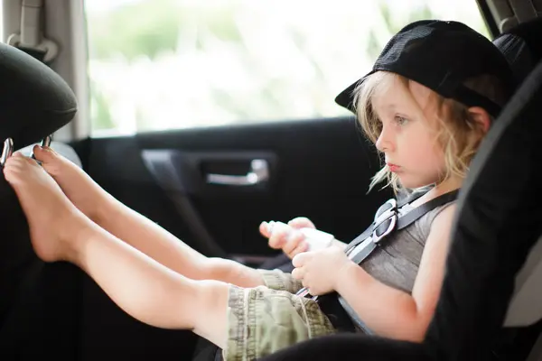 Male Toddler Feet Staring Back Seat Car — Stock Photo, Image