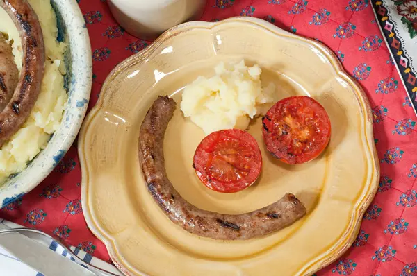 Toulouse sausage on plate — Stock Photo, Image