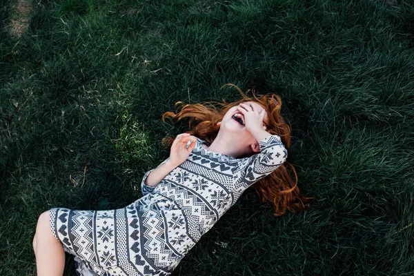 High Angle View Girl Lying Grass Covering Face Laughing — Stock Photo, Image