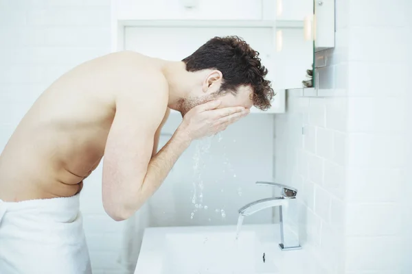 Young Man Washing Face Bathroom Sink — Stock Photo, Image