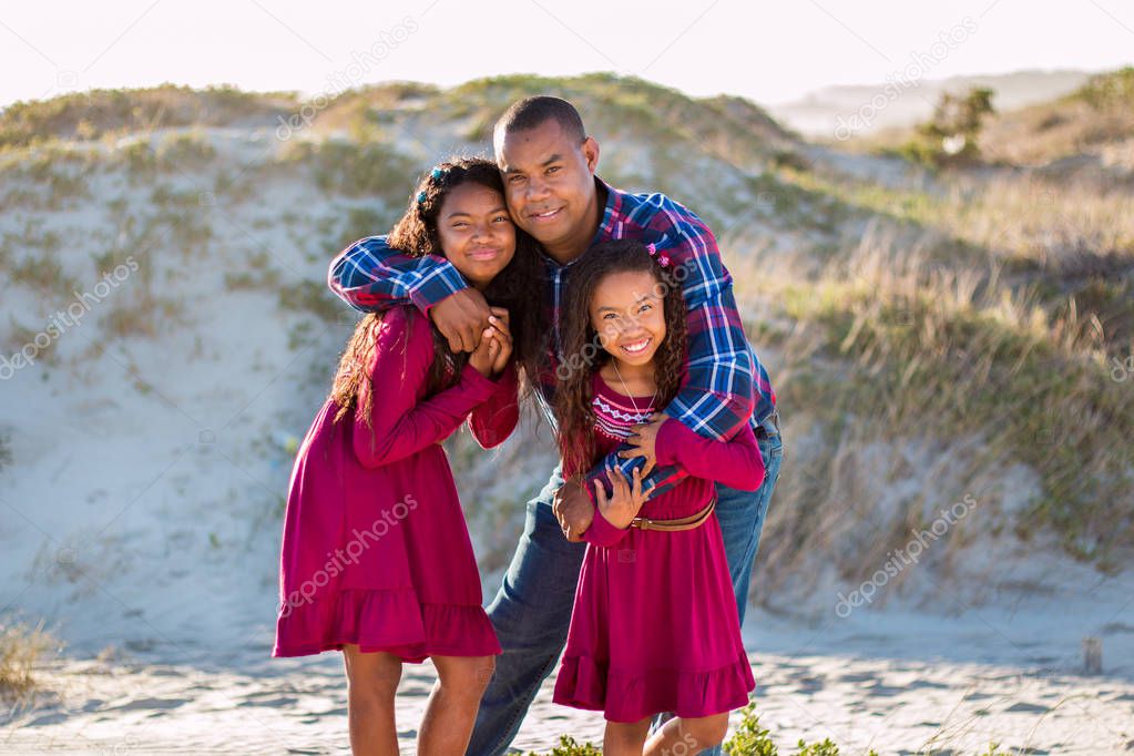 Happy family father with daughters