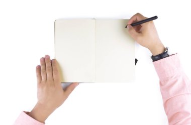 Not defteri tutan eller.