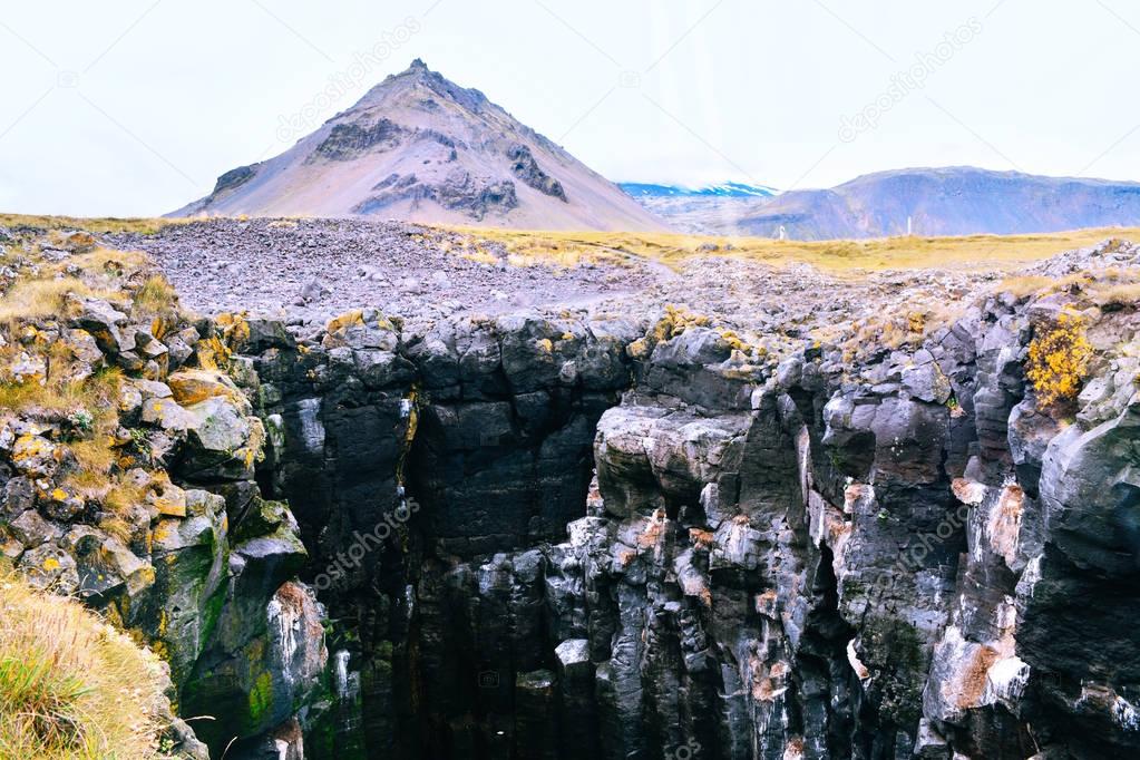 Basalt formations at the coastline in Iceland.