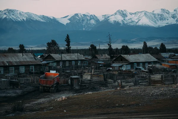 Remote mountain house at sunset