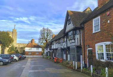 Chilham, Kent, UK - December 22, 2019:  Ancient leaded windows a