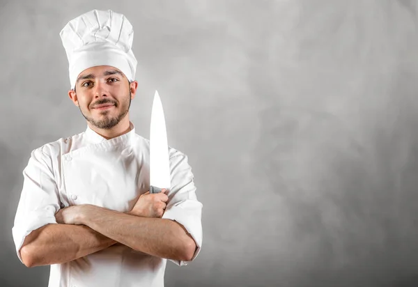 Joven Chef con cuchillo —  Fotos de Stock