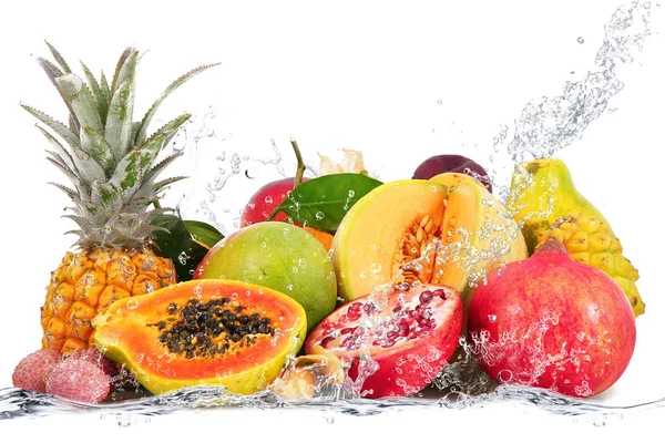 Fresh fruits falling in water — Stock Photo, Image