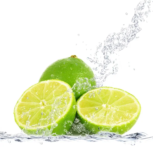 Fresh lime falling in water — Stock Photo, Image