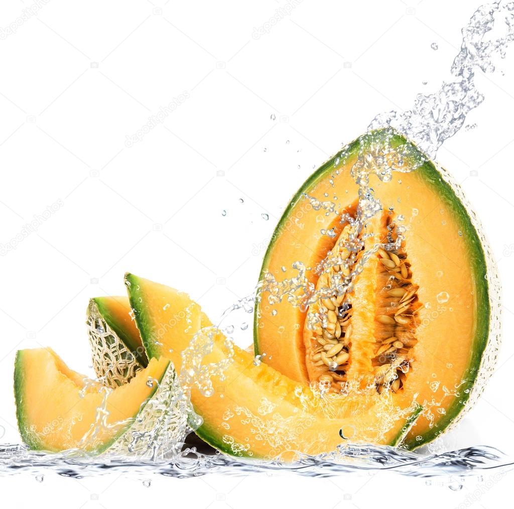 melon falling in water