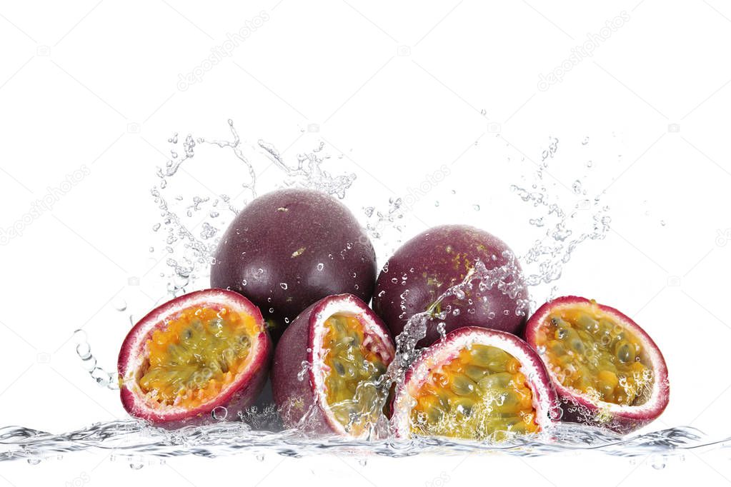 passion fruit falling in water