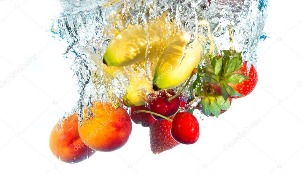 fruits falling in water
