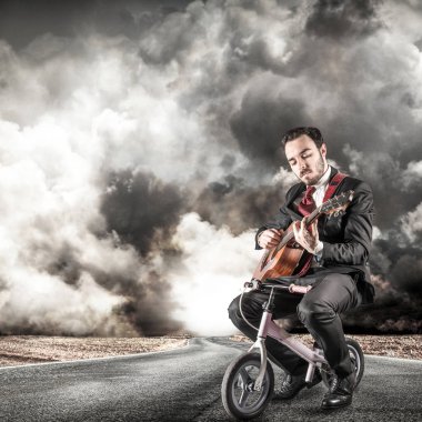 Genç Yöneticisi oynamak bir gitar