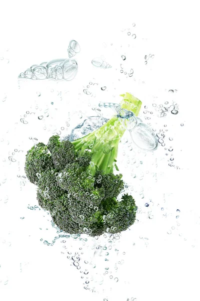 Fresh cabbage falling in water — Stock Photo, Image