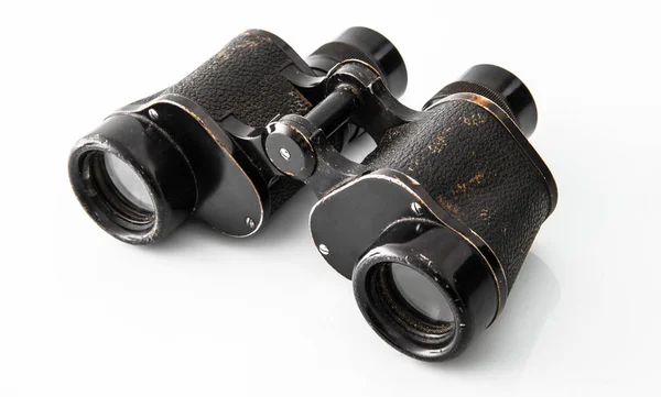 Black binoculars on white background — Stock Photo, Image