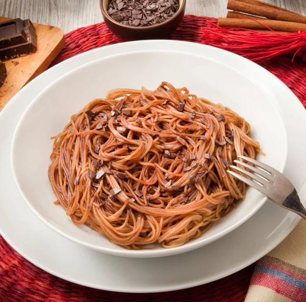 italian spaghetti with chocolate and pepper