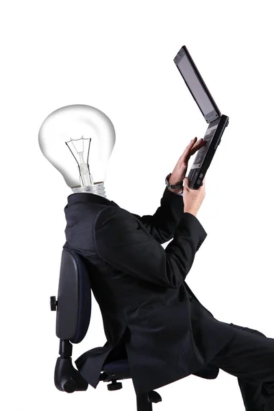 Muž s počítač a head žárovka — Stock fotografie