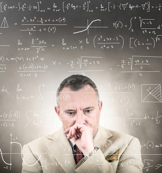 Complex mathematical calculations on blackboard Stock Photo - Alamy