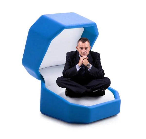 Man sitting in jevel case — Stock Photo, Image