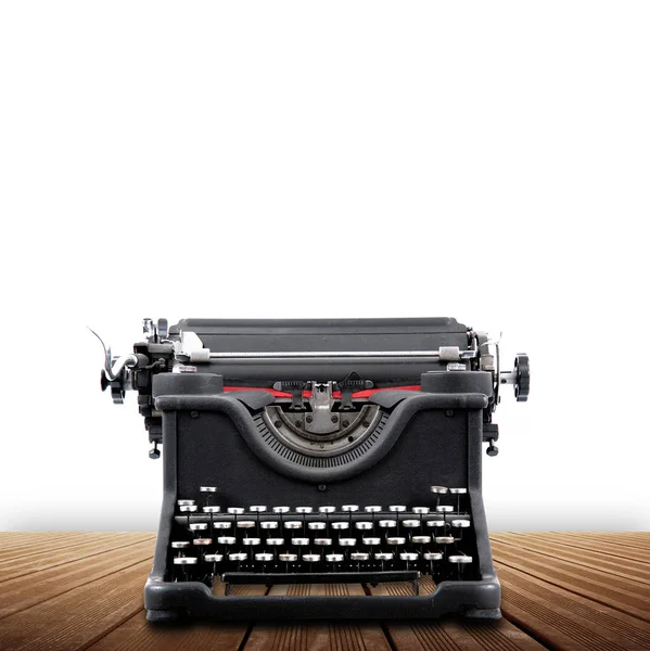 Alte Schreibmaschine auf weißem Hintergrund — Stockfoto