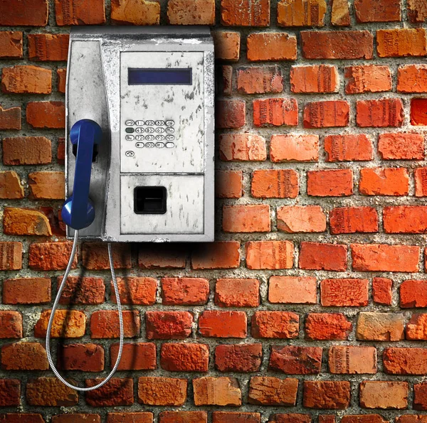 Telefone público no fundo da parede — Fotografia de Stock
