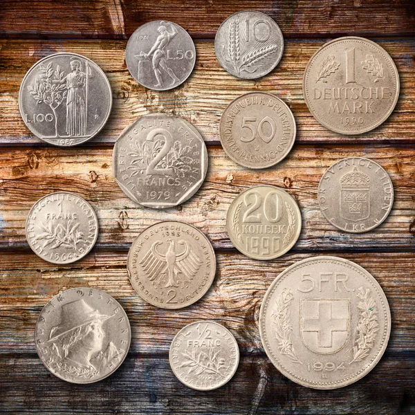 metal coins in wood background