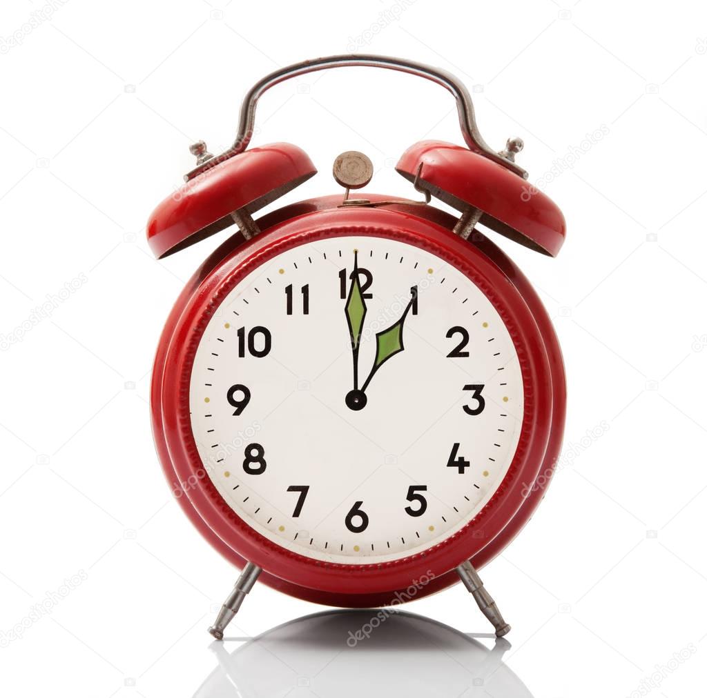alarm clock at one hour on white background