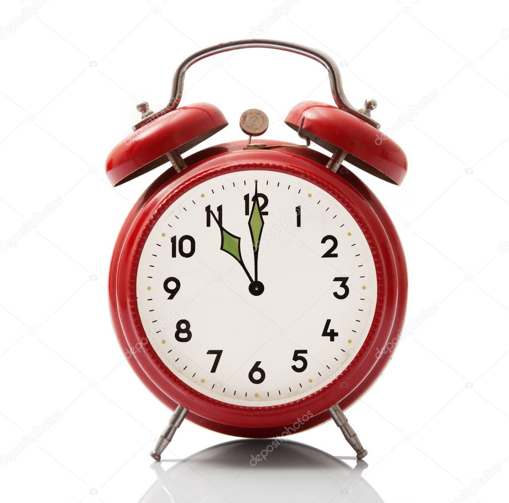 alarm clock at eleven hour on white background