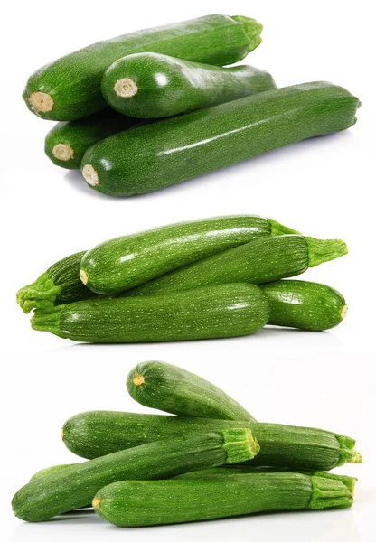 Färsk zucchini på vit bakgrund — Stockfoto