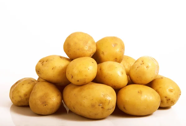Fresh potatoes on white background — Stock Photo, Image