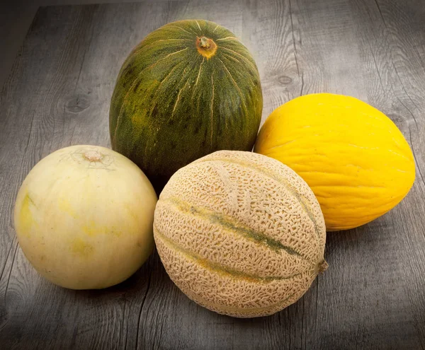 Melon on wooden background — Stock Photo, Image