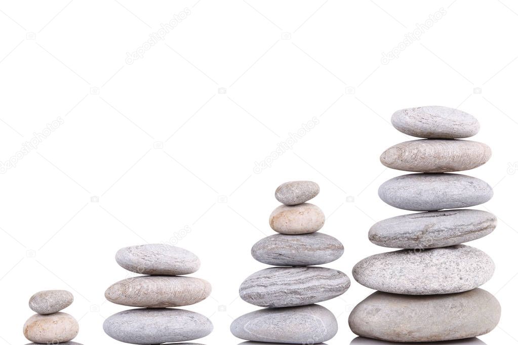 stacked stones on white background
