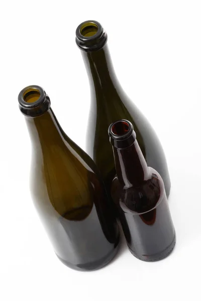 Bottiglie di vetro su sfondo bianco — Foto Stock