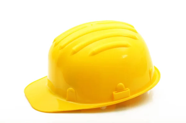 Casco de seguridad clásico amarillo en fondo blanco — Foto de Stock