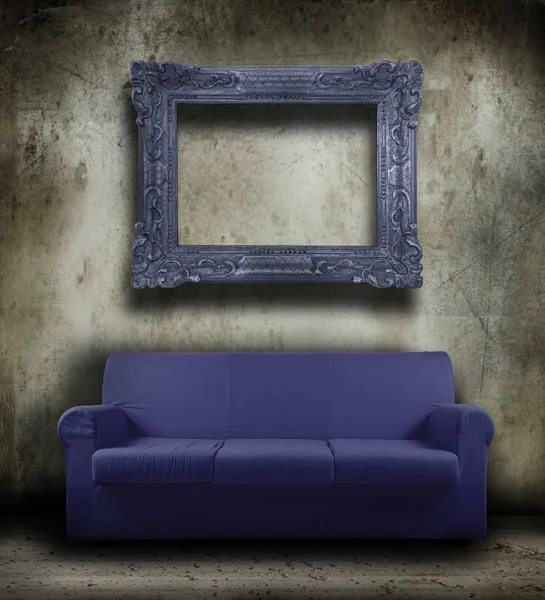 Old sofa in grunge background — Stock Photo, Image