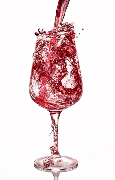 Glass with ice and wine splash — Stock Photo, Image